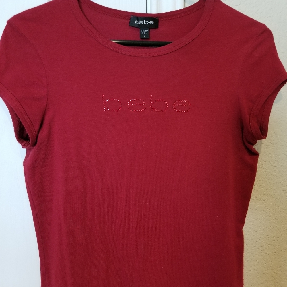 Bebe Fitted T-shirt with red rhinestones